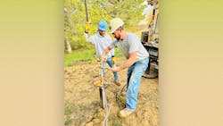 Volunteers working on the new system. Volunteers working on the new system.