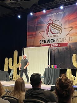 Jon Dorenbos, former NFL Player and magician, delivers one of the keynote speeches at Service World Expo.