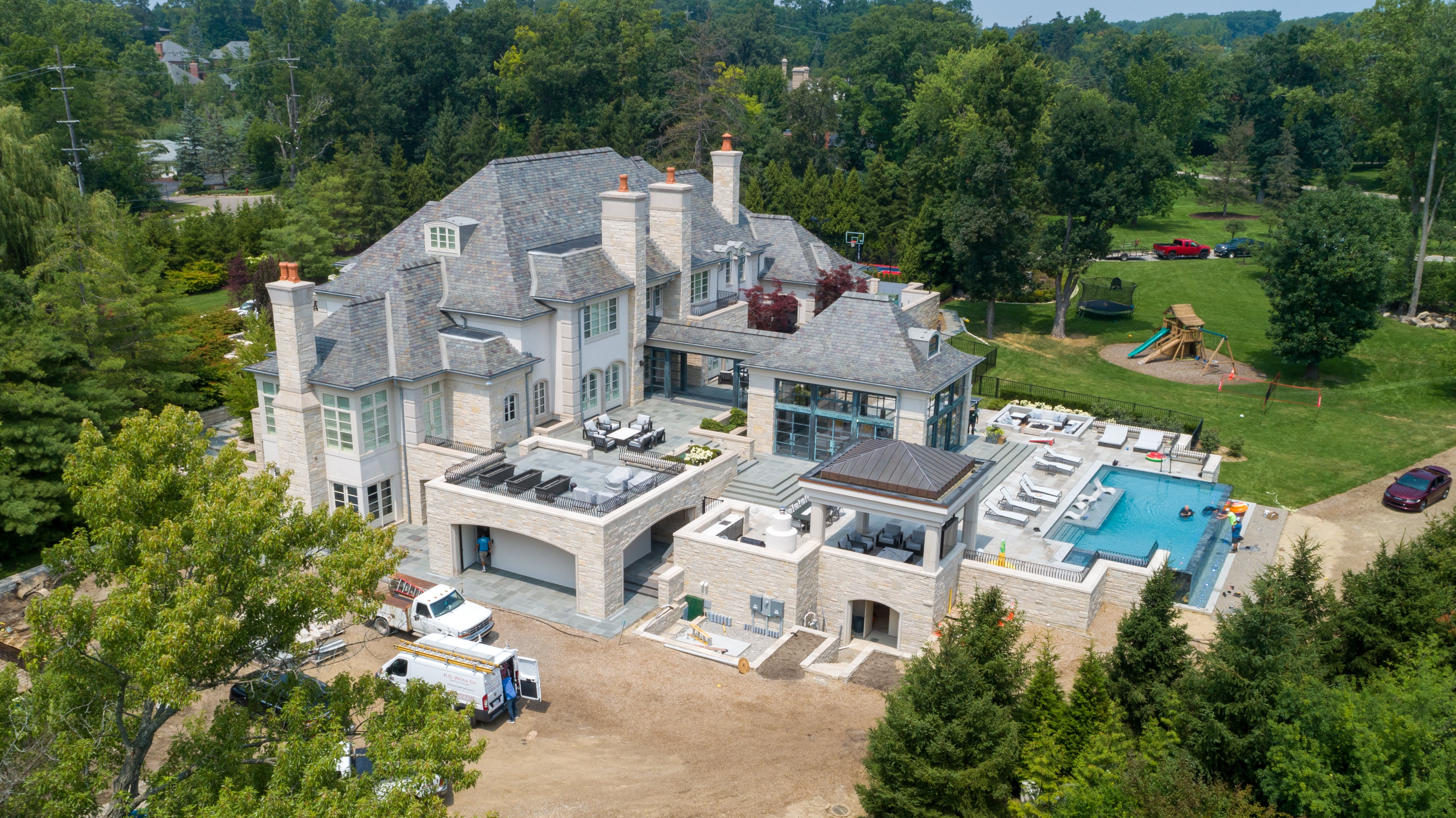 The owners of an existing, 25,000-square foot home in the Detroit's Bloomfield Hills area added an outdoor living space in 2023, hiring Center Line Mechanical for the heating component.