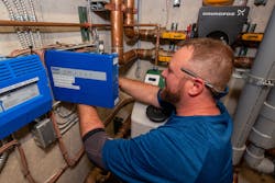 Landis, Center Line installer, wires a tekmar switching relay. Landis, Center Line installer, wires a tekmar switching relay.