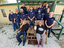 The Solares family poses with project volunteers. The Solares family poses with project volunteers.