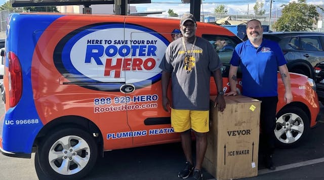 Rooter Hero volunteers donate a ice maker to a local high school.