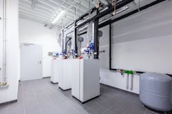 Heat pump room in a commercial building. Heat pump room in a commercial building.