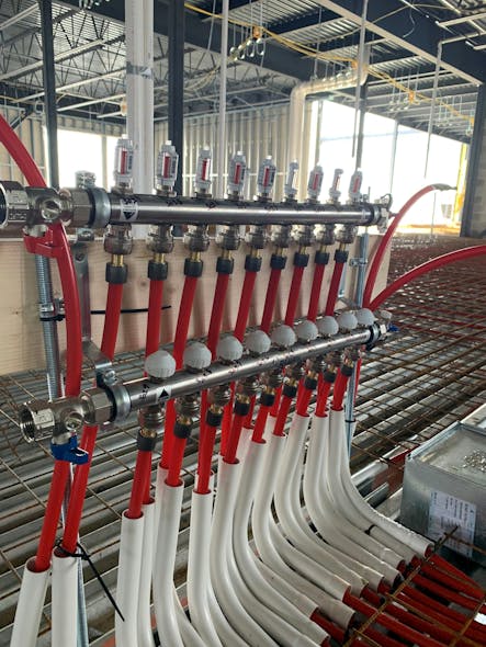 The system at Edward Little High School features 101 PRO-BALANCE&circledR; manifolds, which were joined to RAUPEX&circledR; O2 barrier pipe with 445 EVERLOC+&circledR; R-20 connectors.