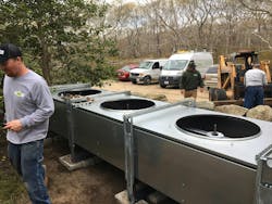 25-ton fluid cooler in place with legs attached awaiting re-install of fans and motors. 25-ton fluid cooler in place with legs attached awaiting re-install of fans and motors.