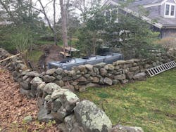 25-ton fluid cooler reassembled behind the stone walls. 25-ton fluid cooler reassembled behind the stone walls.