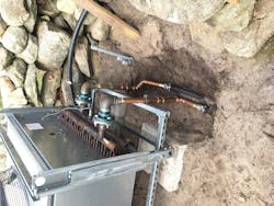 Fluid cooler supply and return connections made the HDPE pipes. Fluid cooler supply and return connections made the HDPE pipes.