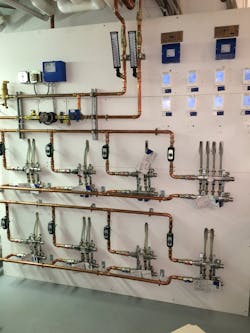 Mixing station for radiant zones with remote thermostats. Mixing station for radiant zones with remote thermostats.
