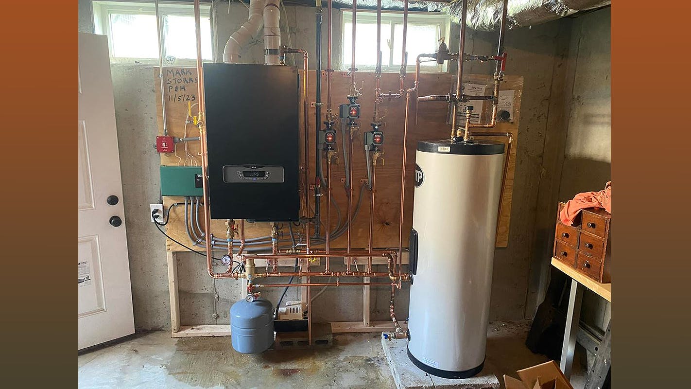 After: Mark Storrs replaced the boiler with an HTP Elite Fire Tube Ultra Boiler, which resists combustion chamber damage and scale buildup.