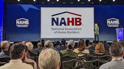 Alicia Huey, Chairman of the Board of the NAHB, addresses the audience during the 2024 Meeting of the Membership at the International Builder&apos;s Show (IBS).