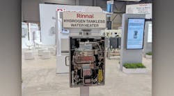 A hydrogen-powered tankless water heater, with the cover off, on display at the Rinnai booth during AHR Expo 2024.