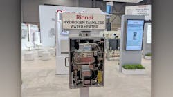 A hydrogen-powered tankless water heater, with the cover off, on display at the Rinnai booth during AHR Expo 2024. A hydrogen-powered tankless water heater, with the cover off, on display at the Rinnai booth during AHR Expo 2024.