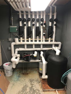 Seriously confused piping in the mechanical room along with insulation. Seriously confused piping in the mechanical room along with insulation.