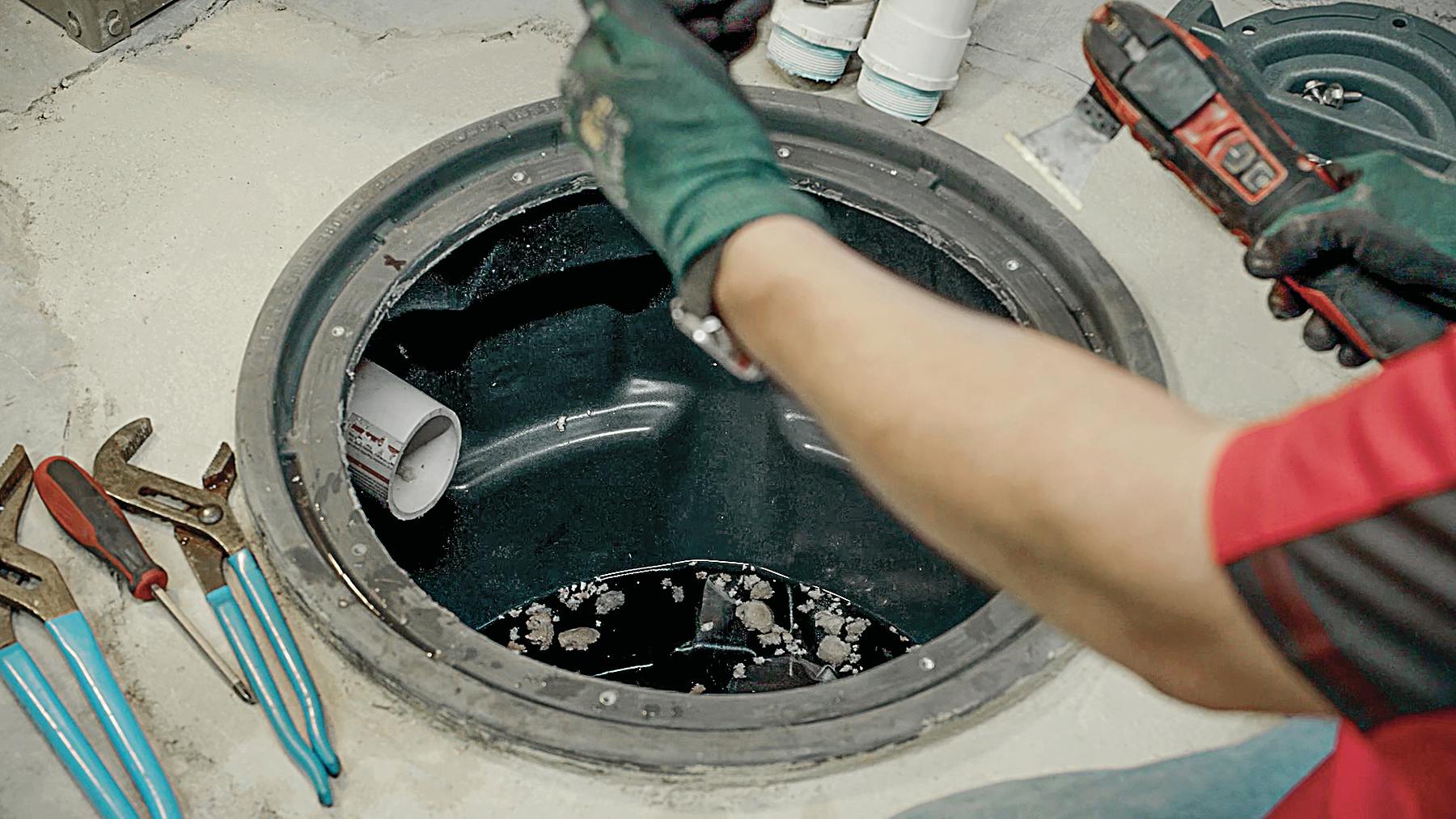 Servicing a submersible pump.