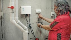 Dominick Rudd, finishing up the installation of the Sanipit 24 GR retrofit pump kit. Dominick Rudd, finishing up the installation of the Sanipit 24 GR retrofit pump kit.