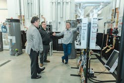 Showing guests around the new ILC. Showing guests around the new ILC.