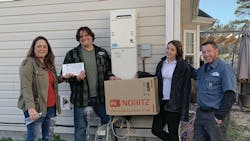 Kyndra Colosetti (far left) and Michael Stefans (far right) of Colosetti Plumbing partnered with Noritz America’s tankless water heaters to donate an NR66 series to former veteran Brad Benjamin (center left). Kyndra Colosetti (far left) and Michael Stefans (far right) of Colosetti Plumbing partnered with Noritz America’s tankless water heaters to donate an NR66 series to former veteran Brad Benjamin (center left).