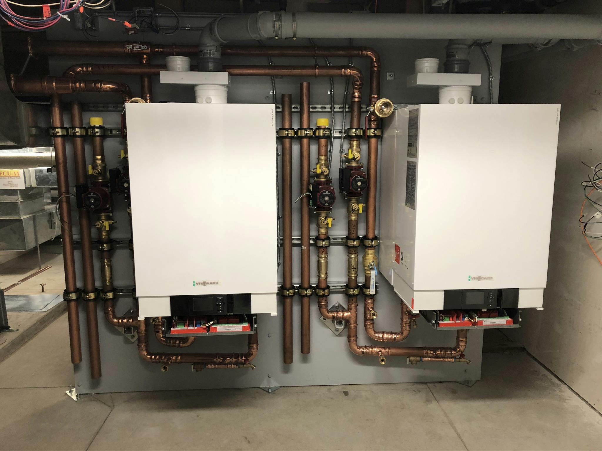 Boiler piping almost done.