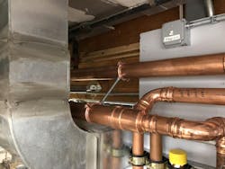 Loop supply and return piping installed to permit pressing. Loop supply and return piping installed to permit pressing.