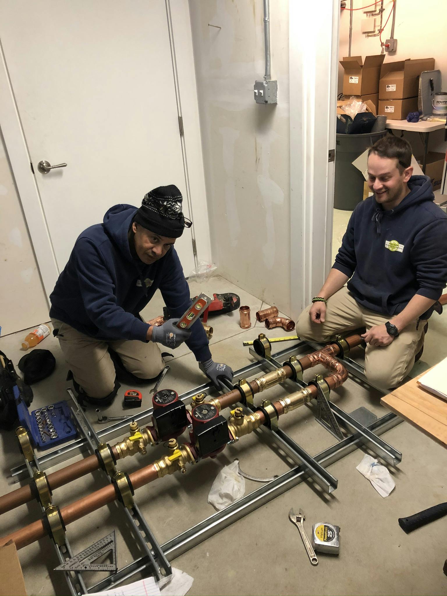 Strut framework anchored to the floor for assembly of boiler piping.