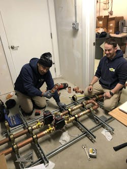 Strut framework anchored to the floor for assembly of boiler piping. Strut framework anchored to the floor for assembly of boiler piping.