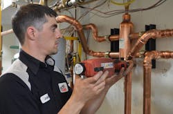 Vertex Mechanical jobsite supervisor Jared Fox completes installation of a Taco hydraulic separator. Vertex Mechanical jobsite supervisor Jared Fox completes installation of a Taco hydraulic separator.