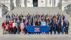 A group photo on the steps of the US Capitol Building. A group photo on the steps of the US Capitol Building.