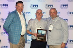 PPI President, David Fink (left) congratulates Jean-François Lavoie and Phillipe Côté of Versaprofiles on winning the Project of the Year for the Building & Construction Division of the association. PPI President, David Fink (left) congratulates Jean-François Lavoie and Phillipe Côté of Versaprofiles on winning the Project of the Year for the Building & Construction Division of the association.
