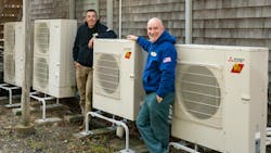 Dave Sprague and Brian Nelson with heat pumps. Dave Sprague and Brian Nelson with heat pumps.