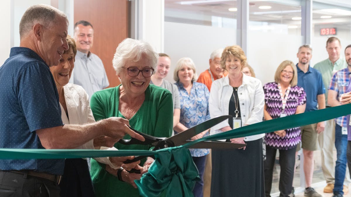 McElroy President and CEO Chip McElroy, Executive Vice President of Finance/Treasury Donna (McElroy) Dutton, and Executive Vice President of International Market Development Peggy (McElroy) Tanner join in cutting the ribbon for the McElroy Museum, unveiled Wednesday at McElroy&rsquo;s newest campus in the Tulsa metro area.