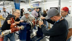 A senior instructor helps trainees get hands-on. Over the last decade, Watts Water Technologies has invested tens of millions into training and education. A senior instructor helps trainees get hands-on. Over the last decade, Watts Water Technologies has invested tens of millions into training and education.
