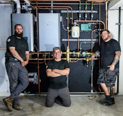 Mike Flynn, Ryan Adam and Tommie Boymann with the finished installation. Mike Flynn, Ryan Adam and Tommie Boymann with the finished installation.