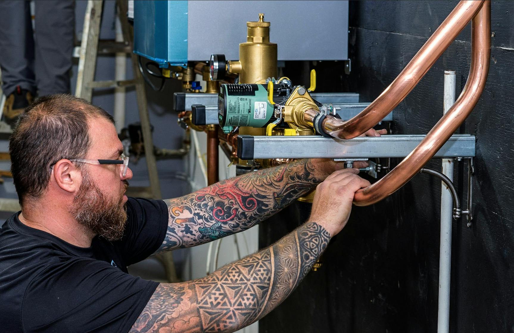 The install featured baseboard heat powered by an NTI FTVN 199 boiler with a 20-gallon NTI SW-20 wall-hung indirect water heater.