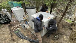 Sliding the chillers into location. Sliding the chillers into location.