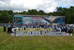 Merit Brass employees by the We Supply America RV. Merit Brass employees by the We Supply America RV.