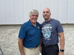 Dirk Beveridge (left) with Merit Brass Manager Michael McKinney. Dirk Beveridge (left) with Merit Brass Manager Michael McKinney.