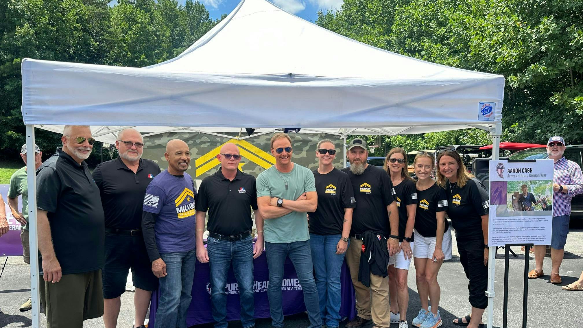 Pictured with hosts Montel Williams and Art Edmonds from Service Experts are Cary Reed, Greg Worley, Gary Connor (Komfort Air General Manager), Ed Smith (Komfort Air), Lisa Lange, Delaney Nicodemus, and Heather Weaverling.