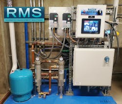 Villanova University implemented a rainwater harvesting system to be used for toilet and urinal flushing. Rainwater is collected from the rooftop and pre-filtered through a horizontal High-Volume Filter before entering two 20,000-gallon fiberglass reinforced plastic storage cisterns. The rainwater is then pumped through a treatment skid (pictured) before being stored in a polyethylene tank. From there, the treated water is repressurized for distribution to the toilets and urinals when demand is signaled. Villanova University implemented a rainwater harvesting system to be used for toilet and urinal flushing. Rainwater is collected from the rooftop and pre-filtered through a horizontal High-Volume Filter before entering two 20,000-gallon fiberglass reinforced plastic storage cisterns. The rainwater is then pumped through a treatment skid (pictured) before being stored in a polyethylene tank. From there, the treated water is repressurized for distribution to the toilets and urinals when demand is signaled.