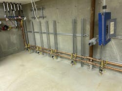 The new inside water loop with tees for the six new heat pumps. The new inside water loop with tees for the six new heat pumps.