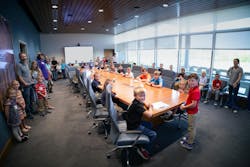A group of 'Future Franklineers' take an important board meeting. A group of 'Future Franklineers' take an important board meeting.