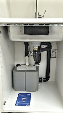 In this application, only a single drainage connection was needed, so the Saniswift Pro was positioned directly under the sink in a cabinet. Due to the Saniswift Pro being compact and quiet—ideal for an office application. In this application, only a single drainage connection was needed, so the Saniswift Pro was positioned directly under the sink in a cabinet. Due to the Saniswift Pro being compact and quiet—ideal for an office application.