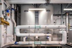 Lock-Temp Round Jacketed Storage Tanks in the facility's mechanical room. Lock-Temp Round Jacketed Storage Tanks in the facility's mechanical room.