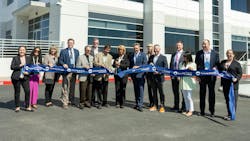 A ribbon-cutting ceremony at the grand opening celebration. A ribbon-cutting ceremony at the grand opening celebration.