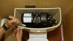 A Flushmate-equipped pressure-assisted toilet.