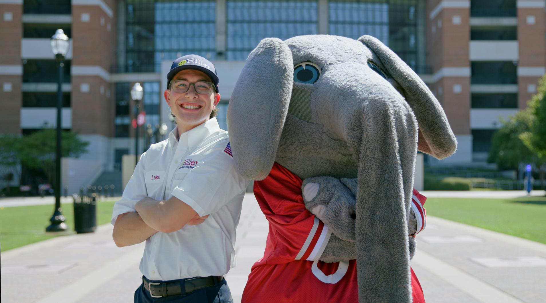 A Hiller technician and Big Al, mascot of the University of Alabama.