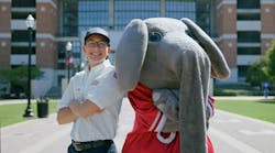 A Hiller technician and Big Al, mascot of the University of Alabama. A Hiller technician and Big Al, mascot of the University of Alabama.