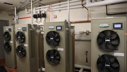The four CHP-120 Fully Integrated Commercial Heat Pump Water Heaters (HPWH) in the mechanical room, along with piping and circulators. The four CHP-120 Fully Integrated Commercial Heat Pump Water Heaters (HPWH) in the mechanical room, along with piping and circulators.