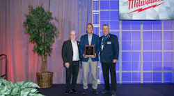 Michael Carter (center), PHCC's Plumbing Instructor of the Year.