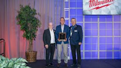 Michael Carter (center), PHCC's Plumbing Instructor of the Year. Michael Carter (center), PHCC's Plumbing Instructor of the Year.