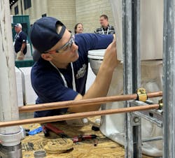 Hard at work during the plumbing apprentice competition. Hard at work during the plumbing apprentice competition.